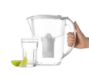 Woman with water filter jug, glass and lemon slices on white background