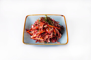 salad of cabbage, red beetroot, carrots. on a white background