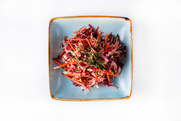 salad of cabbage, red beetroot, carrots. on a white background