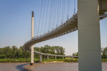 The Bob Kerrey Bridge in Omaha, Nebraska connects with Council Bluffs, Iowa - obrazy, fototapety, plakaty
