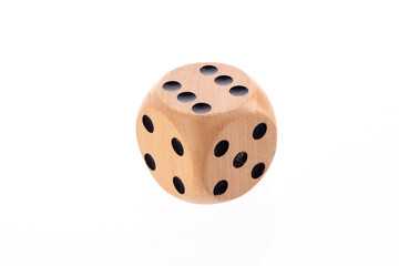 Big wooden dice isolated on white background