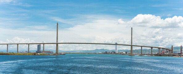 Cebu City, Philippines - The main spain of CCLEX, a cable stayed bridge, as seen from Cebu harbor....
