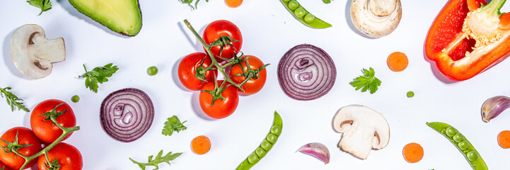 Fototapeta premium Various fresh vegetables pattern. Raw organic vegetables, salad ingredients bright flatlay on white background. Healthy diet common diet, vegan vegetarian food cooking background copy space