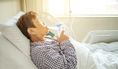 Hospital patient doing nebulization therapy