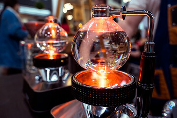 Siphon Coffee Experience Brewing Glass. Vacuum pot background.