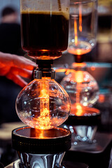 Siphon Coffee Experience Brewing Glass. Vacuum pot background.