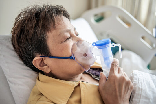 Hospital patient doing nebulization therapy