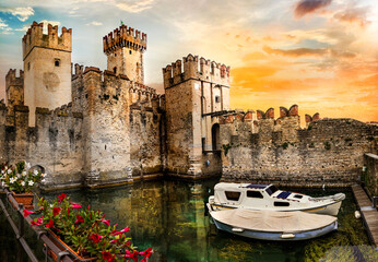 Most beautiful medieval castles of Italy - Scaligero Castle in Sirmione. Lake Lago di Garda in...