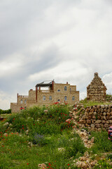 12 May 2022 Elbegendi village Midyat Mardin Turkey. Church and cityscape of elbegendi village in...