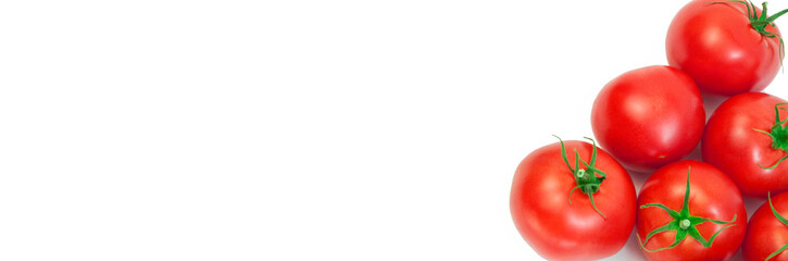 ripe tomatoes on a white background. the concept of cooking tomato sauce. red vegetables on a light texture. juicy pink tomatoes on the table