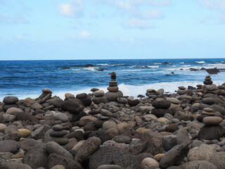 beautiful stone formation in front of the blue ocean 