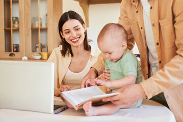 Family moment lifestyl, multitasking mother working from the kitchen.