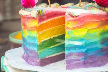 Colourful rainbow cake at Brick Lane market in London
