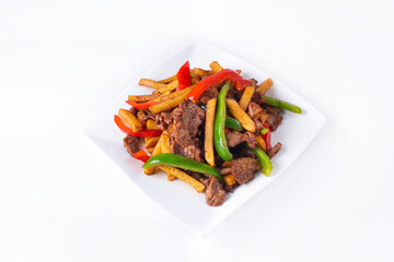 fries with meat in a white plate on a white background