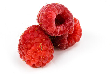 Fresh Red Raspberries isolated on an extendable white background. Macro detailing, Studio lighting, ample space for copy. 