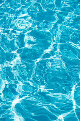 Pool water background, blue wave abstract or rippled water texture background.