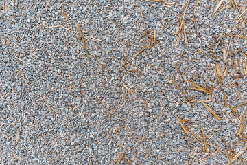 Texture of gravel stone used for farm driveway surface as background