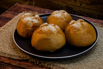 Putak bread on wooden background, studio lighting, macro details, Philippine food