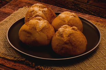 Putak bread on wooden background, studio lighting, macro details, Philippine food