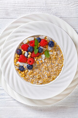 hulled whole grain oat porridge with berries