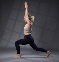 Senior woman in yoga pose