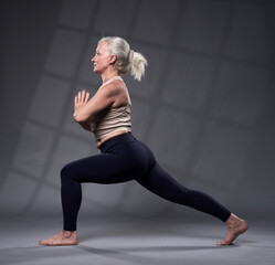 Fototapeta premium Senior woman in yoga pose