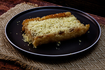Cassava Cake shot inn wooden background, isolated, no one, studio lighting, macro detailing and ample copy space