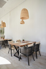 Empty wooden table in an eco-style restaurant