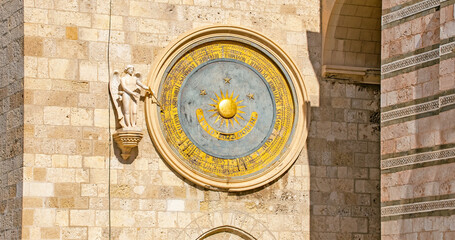 Fototapeta na wymiar Messina Cathedral astronomical clock on its bell tower Sicily Italy 
