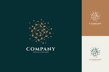 Spiral leaf logo with polka dots, line art style, abstract, luxurious and organic, available in several color previews and backgrounds.
