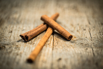 Cinnamon sticks on Wood Table