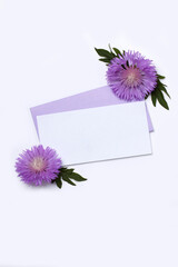 Invitation or greeting card mockup with blank and thistle flowers on white background