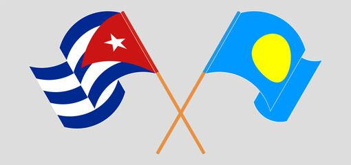 Crossed and waving flags of Cuba and Palau