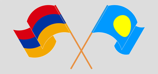 Crossed and waving flags of Armenia and Palau