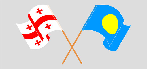 Crossed and waving flags of Georgia and Palau