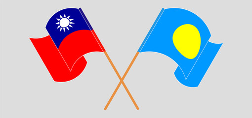 Crossed and waving flags of Taiwan and Palau
