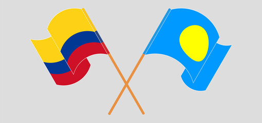 Crossed and waving flags of Colombia and Palau