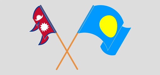 Crossed and waving flags of Nepal and Palau