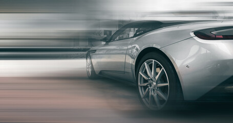 silver sports car with blur effect - Powered by Adobe