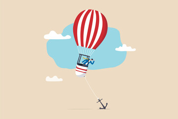 Problem or trouble to prevent business to grow up, mistake or failure, obstacle or error to make business fail, frustrated businessman look at heavy tied anchor to prevent his balloon to flying up. © Nuthawut