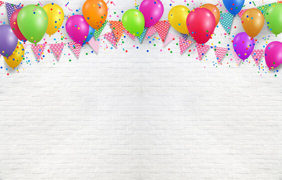 Colorful party balloons and flags hanging  with confetti and Ribbons on white wall background, birthday, anniversary, celebration event, festival greeting card background, scene for shooting.