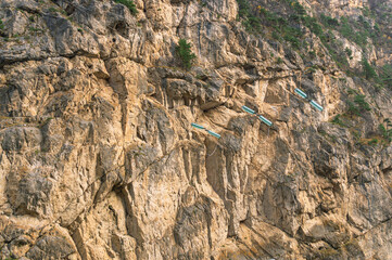 Power lines on the background of a mountain peak. Electrical networks. Wires for the transmission of electricity.