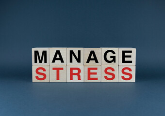 Managing Stress. Cubes form words Manage Stress.