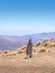 Unidentified Basotho man wearing traditional blanket in the Mountains of Lesotho