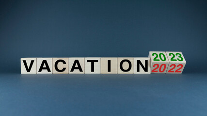 Vacation 2022 - 2023. Cubes form the words Vacation 2022 - 2023.