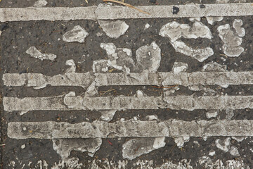 White paint on the pavement. Background texture.