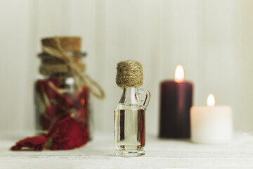 Aroma oil bottle and aroma candles, background with space for text