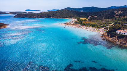 Obraz premium Aerial shot of Tuerredda beach on a beautiful day, Sardinia, Italy. Aerial drone view of Tuerredda in Sardegna. Famous Tuerredda beach on the south of Sardinia near Teulada. Sardinia, Italy.