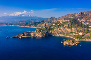Taormina is a city on the island of Sicily, Italy. Mount Etna over Taormina cityscape, Messina,...