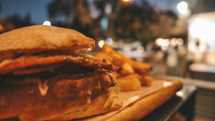 lomito typical dish of Argentina. meat sandwich with ham and cheese